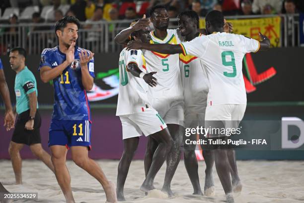 Amar Samb of Senegal celebrates with team mates after scoring his goal during the FIFA Beach Soccer World Cup UAE 2024 Group C match between Japan...