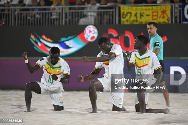 Amar Samb of Senegal celebrates with team mates after scoring his goal during the FIFA Beach Soccer World Cup UAE 2024 Group C match between Japan...
