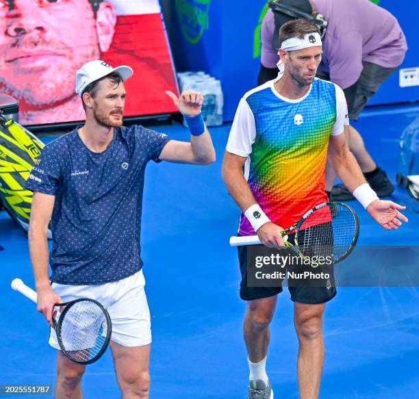 Jamie Murray from Great Britain and Michael Venus from New Zealand are celebrating after winning their doubles semifinal match against Ariel Behar...