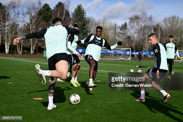 Nicolas Jackson and Alfie Gilchrist of Chelsea during a training session at Chelsea Training Ground on February 23, 2024 in Cobham, England.