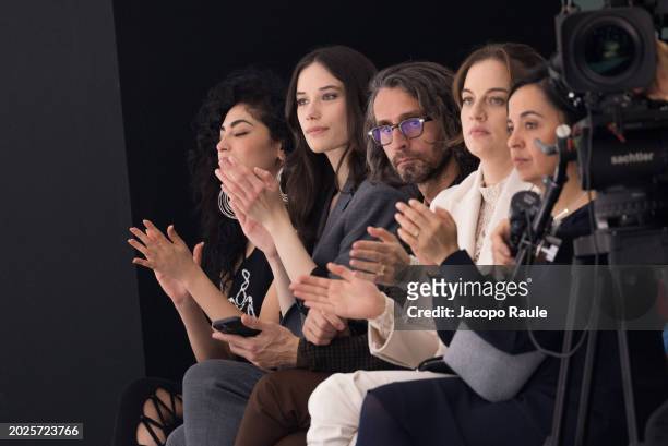 Mina El Hammani, Ella Bleu Travolta and Simone Marchetti attend the Twinset Fashion Show during the Milan Fashion Week - Womenswear Fall/Winter...
