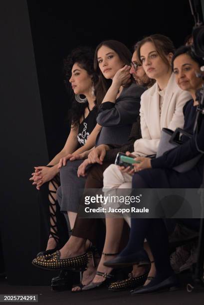 Mina El Hammani and Ella Bleu Travolta attend the Twinset Fashion Show during the Milan Fashion Week - Womenswear Fall/Winter 2024-2025 at...