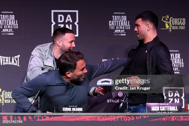 Eddie Hearn, Chairman of Matchroom Sport , intervenes as Josh Taylor clashes with Jack Catterall during a press conference at the New Century Hall on...