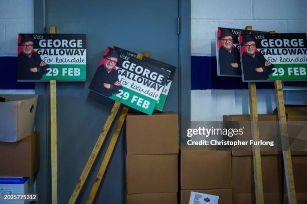 Placards supporting Workers party of Britain candidate George Galloway stand in his election campaign headquarters on February 19, 2024 in Rochdale,...