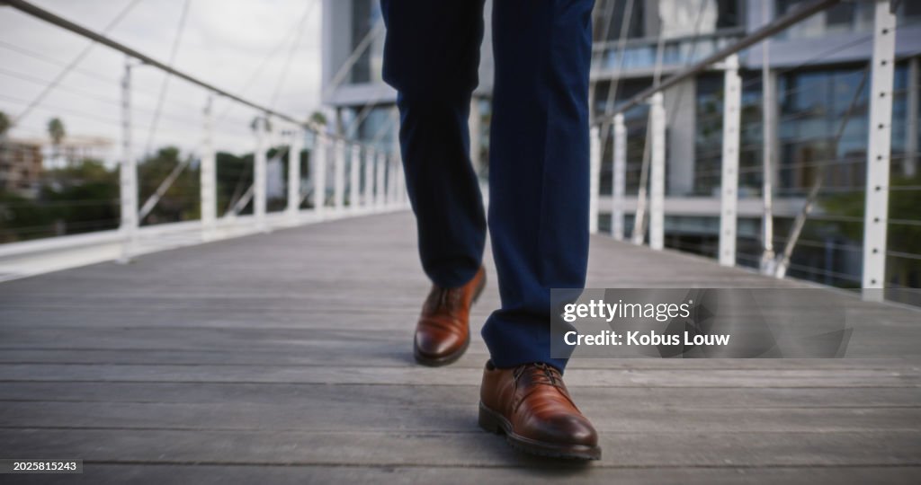Business, person and shoes or city walking on bridge or work commute as accountant or travel, opportunity or journey. Legs, professional and New York or urban building or downtown, employee or career