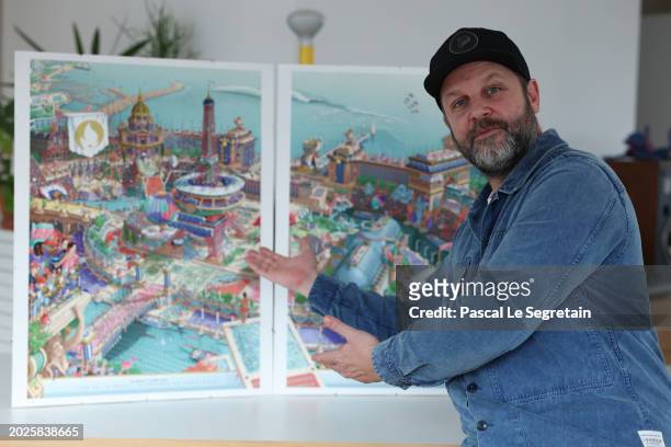 Director of design for Paris 2024, Joachim Roncin, poses in front of the Paris 2024 Official Posters on February 20, 2024 in Ivry-sur-Seine, France....