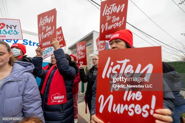 Nurses rally outside Long Island Jewish Valley Stream Hospital for a new contract with better wages and working conditions, on February 1 in Valley...