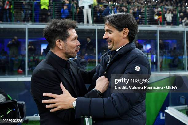 Diego Simeone, Head Coach of Atletico Madrid, and Simone Inzaghi, Head Coach of FC Internazionale, embrace prior to kick-off ahead of the UEFA...