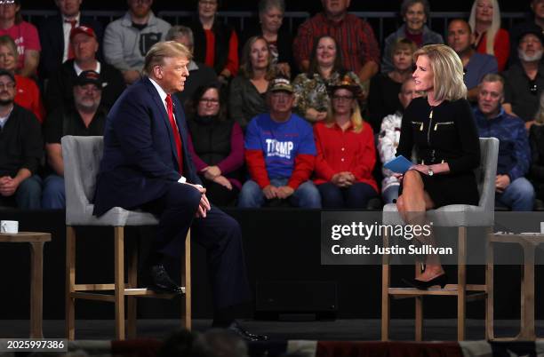 Republican presidential candidate, former U.S. President Donald Trump participates in a Fox News town hall with host Laura Ingraham at the Greenville...