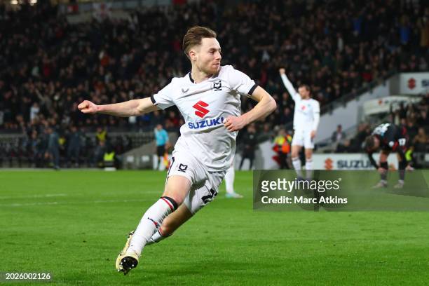 Dan Kemp of MK Dons celebrates scoring a goal during the Sky Bet League Two match between Milton Keynes Dons and Wrexham at Stadium MK on February...
