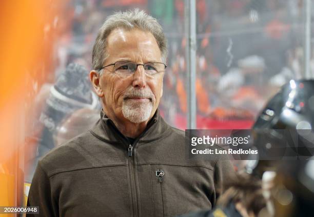 Head Coach of the Philadelphia Flyers John Tortorella watches the play on the ice during the first period against the Arizona Coyotes at the Wells...