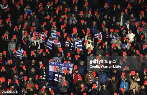 Reading fans show red cards in protest during the Sky Bet League One match between Reading and Port Vale at Select Car Leasing Stadium on February...