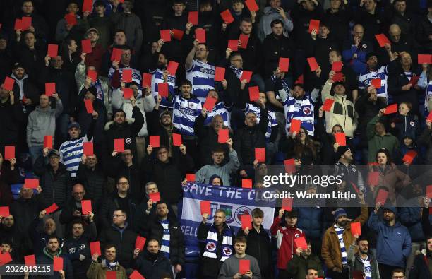 Reading fans show red cards in protest during the Sky Bet League One match between Reading and Port Vale at Select Car Leasing Stadium on February...