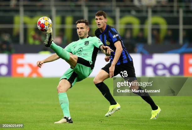 Saul Niguez of Atletico Madrid controls the ball whilst under pressure from Benjamin Pavard of FC Internazionale during the UEFA Champions League...