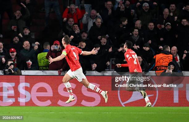 Luuk de Jong of PSV Eindhoven celebrates scoring his team's first goal from the penalty-spot during the UEFA Champions League 2023/24 round of 16...