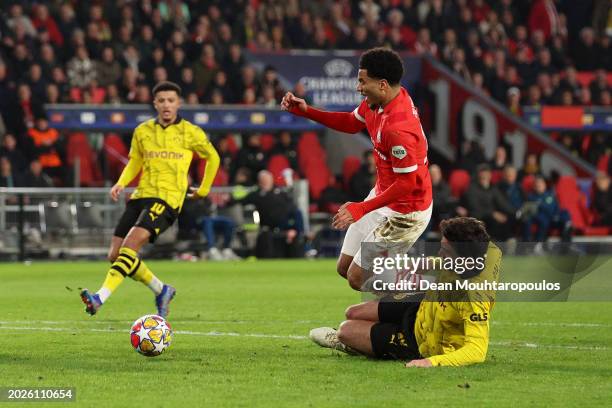 Malik Tillman of PSV Eindhoven is fouled by Mats Hummels of Borussia Dortmund, which results in a penalty during the UEFA Champions League 2023/24...