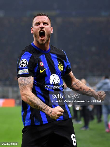 Marko Arnautovic of FC Internazionale celebrates scoring his team's first goal during the UEFA Champions League 2023/24 round of 16 first leg match...