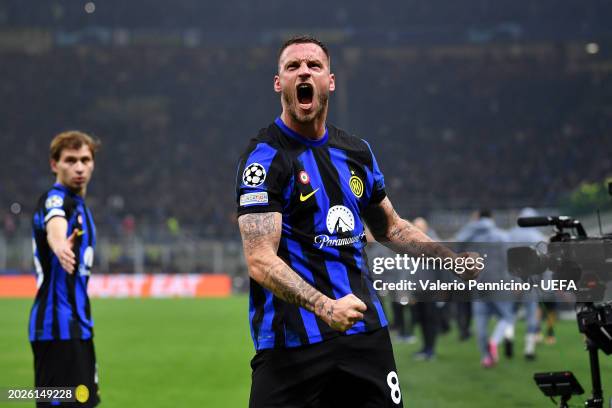 Marko Arnautovic of FC Internazionale celebrates scoring his team's first goal during the UEFA Champions League 2023/24 round of 16 first leg match...