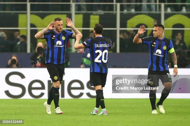 Marko Arnautovic of FC Internazionale celebrates with Hakan Calhanoglu of FC Internazionale after scoring his team's first goal during the UEFA...
