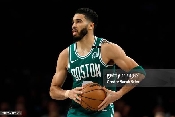 Jayson Tatum of the Boston Celtics looks to pass during the second half against the Brooklyn Nets at Barclays Center on February 13, 2024 in the...