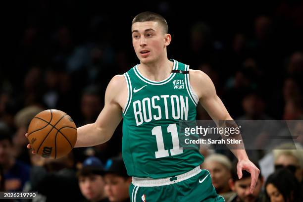 Payton Pritchard of the Boston Celtics controls the ball during the second half against the Brooklyn Nets at Barclays Center on February 13, 2024 in...