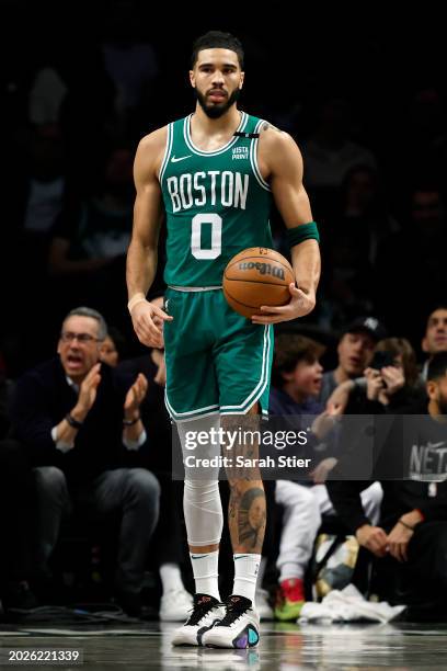 Jayson Tatum of the Boston Celtics looks on during the second half against the Brooklyn Nets at Barclays Center on February 13, 2024 in the Brooklyn...