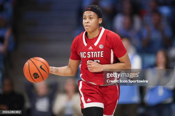 State Wolfpack guard Zoe Brooks brings the ball up court during the college basketball game between the North Carolina Tar Heels and the NC State...