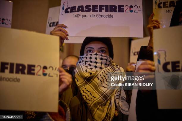 Protester holds a placard reading "Ceasefire 2024" in support of Palestinians in the Gaza Strip amid the Hamas-Israel conflict as demonstrators...