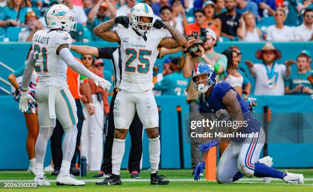 Miami Dolphins cornerback Xavien Howard reacts after defending a pass intended for New York Giants tight end Darren Waller at Hard Rock Stadium on...