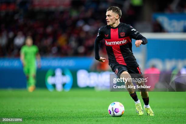 Florian Wirtz of Leverkusen controls the ball during the Bundesliga match between Bayer 04 Leverkusen and 1. FSV Mainz 05 at BayArena on February 23,...