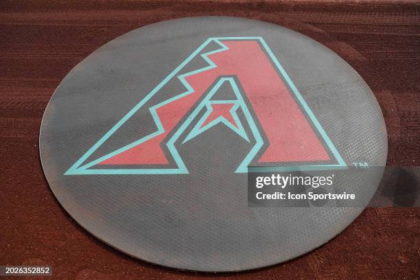 The Arizona Diamondbacks logo on the warm up circle before the MLB spring training baseball game between the Arizona Diamondbacks and the Colorado...