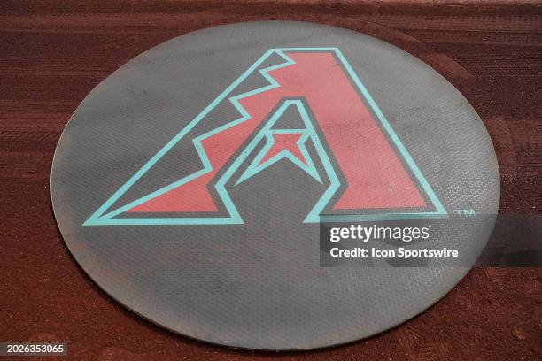 The Arizona Diamondbacks logo on the warm up circle before the MLB spring training baseball game between the Arizona Diamondbacks and the Colorado...