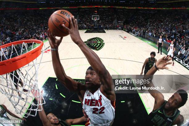Jimmy Butler of the Miami Heat drives to the basket during the game against the New Orleans Pelicans on February 23, 2024 at the Smoothie King Center...
