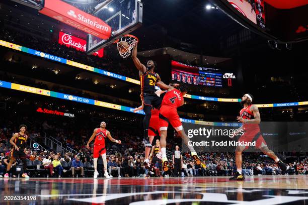 Bruno Fernando of the Atlanta Hawks dunks during the second quarter against the Toronto Raptors at State Farm Arena on February 23, 2024 in Atlanta,...