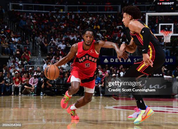 February 23: Immanuel Quickley of the Toronto Raptors drives to the basket during the game against the Atlanta Hawks on February 23, 2024 at State...