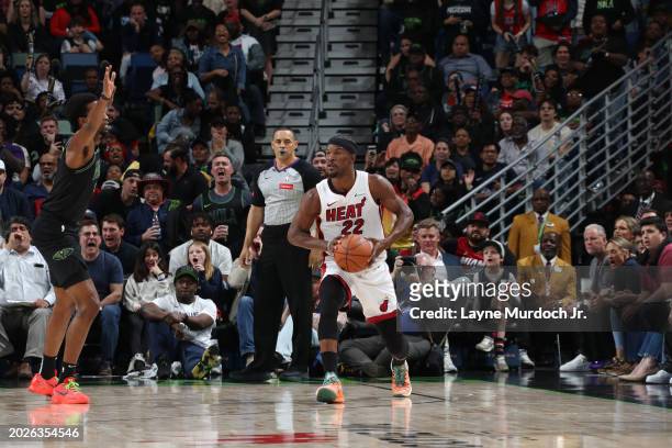 Jimmy Butler of the Miami Heat looks to pass the ball during the game against the New Orleans Pelicans on February 23, 2024 at the Smoothie King...