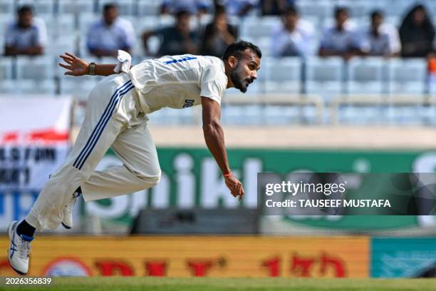 India's Akash Deep bowls during the second day of the fourth Test cricket match between India and England at the Jharkhand State Cricket Association...