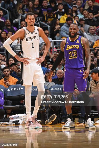Victor Wembanyama of the San Antonio Spurs and LeBron James of the Los Angeles Lakers smile during the game on Feburary 23, 2024 at Crypto.Com Arena...