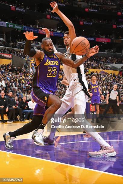LeBron James of the Los Angeles Lakers goes for loose ball during the game against the San Antonio Spurs on Feburary 23, 2024 at Crypto.Com Arena in...