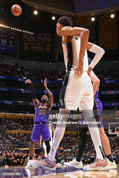 Victor Wembanyama of the San Antonio Spurs looks on during the game against the Los Angeles Lakers on Feburary 23, 2024 at Crypto.Com Arena in Los...