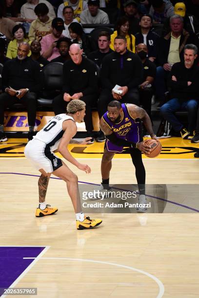 LeBron James of the Los Angeles Lakers handles the ball during the game on February 23, 2024 at Crypto.Com Arena in Los Angeles, California. NOTE TO...