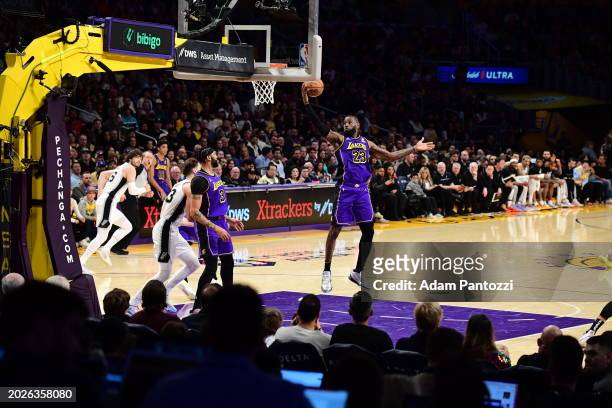 LeBron James of the Los Angeles Lakers grabs the rebound during the game on February 23, 2024 at Crypto.Com Arena in Los Angeles, California. NOTE TO...