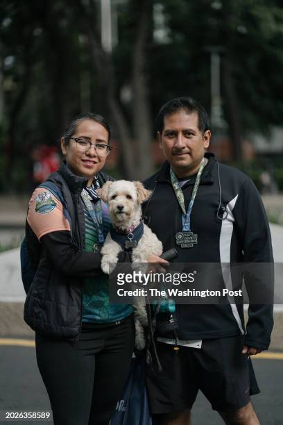 Alfredo Cruz and Elizabeth Line , engineers in telecommunications, poses for a portrait after running a race in Paseo de la Reforma in downtown...