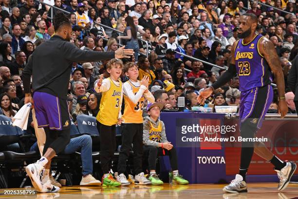 Angelo Russell of the Los Angeles Lakers high fives LeBron James during the game against the San Antonio Spurs on Feburary 23, 2024 at Crypto.Com...
