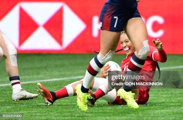 Canada's Asia Hogan-Rochester scores a try against Great Britain during the 2024 HSBC Canada Sevens rugby tournament match between Canada and Great...