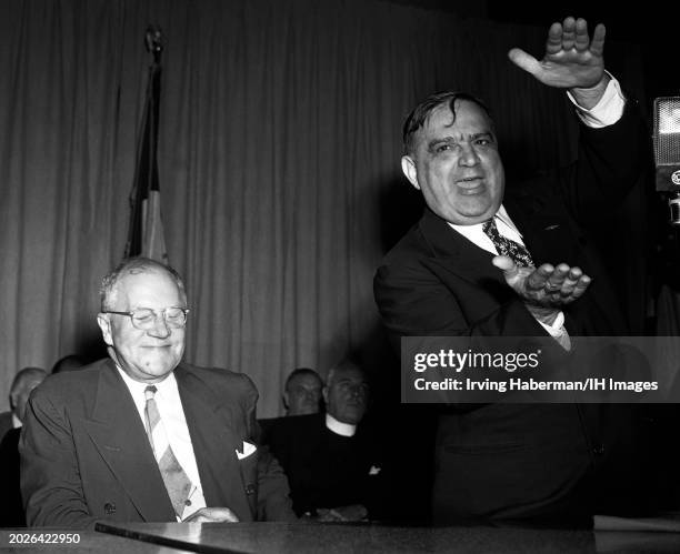 New York City Police Commissioner Lewis J. Valentine listens to American-Italian mayor of New York City Fiorello La Guardia during Valentine's...