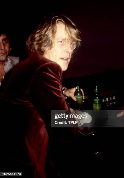 American actor Nick Nolte sits at a bar in New York, New York, circa 1979.