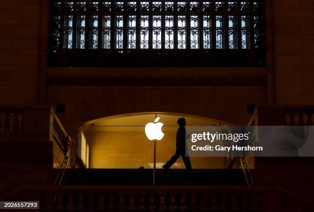 Person walks through the Apple store in Grand Central Terminal on February 20 in New York City.