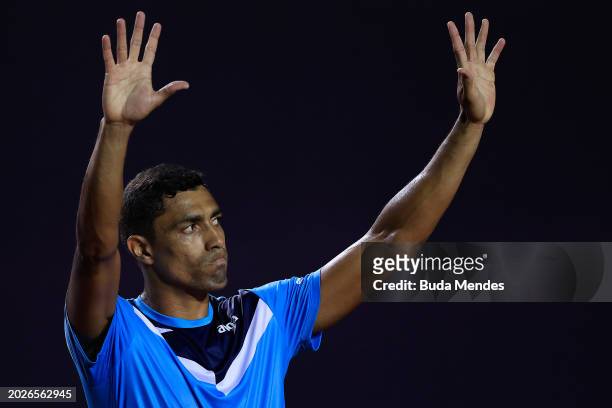 Thiago Monteiro of Brazil celebrates the victory in the singles match against Carlos Alcaraz of Spain during day two of ATP 500 Rio Open presented by...