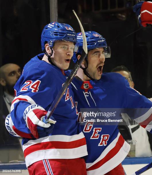 Kaapo Kakko and Erik Gustafsson of the New York Rangers celebrate Kakko's second period goal against the Dallas Stars at Madison Square Garden on...